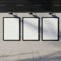 Three Blank Poster Frames on Concrete Wall