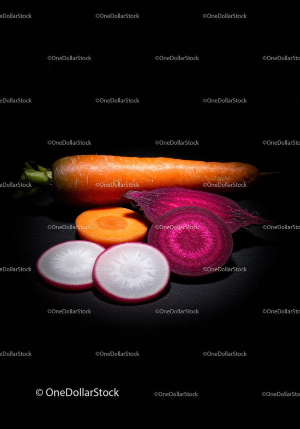 Fresh Organic Root Vegetables on Dark Background