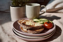 Fresh Cheese Toast with Cucumber Slices and Tomato on Breakfast Plate