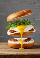 Rustic Bagel Sandwich with Runny Egg and Arugula