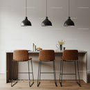 Contemporary Kitchen with Leather Bar Stools and Black Pendant Lights