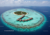 Overwater Bungalows and Tropical Island Paradise in Clear Blue Lagoon