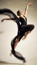 Graceful ballet dancer captured in elegant leap