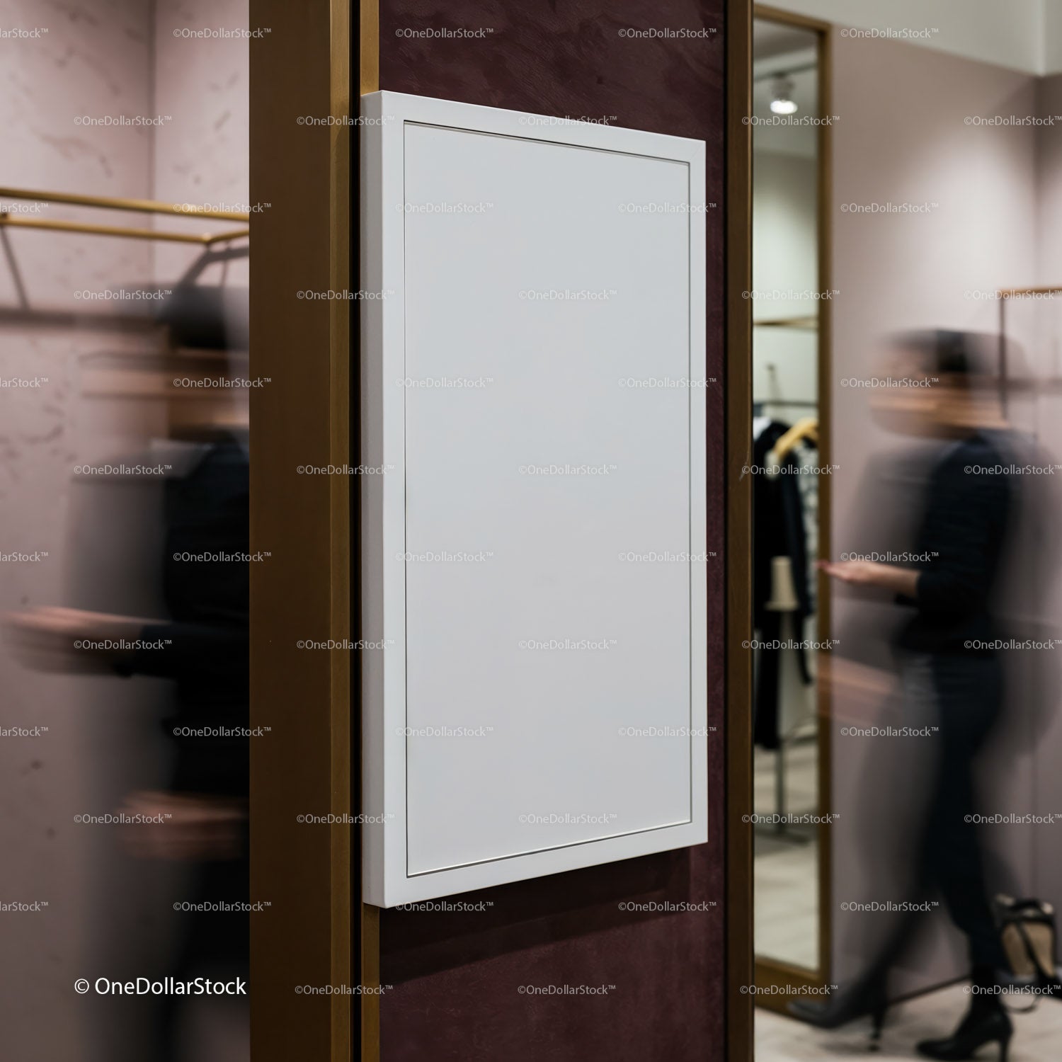 Empty white poster frame in stylish clothing store interior