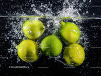 Fresh Green Apples Floating in Water with Splash Effect