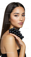Portrait of a Young Elegant Woman with Long Dark Hair and Glamorous Makeup