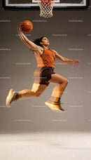 Female Basketball Player Jumping for Dunk in Studio