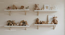 Cozy Nursery Shelves with Plush Teddy Bears and Wooden Toys