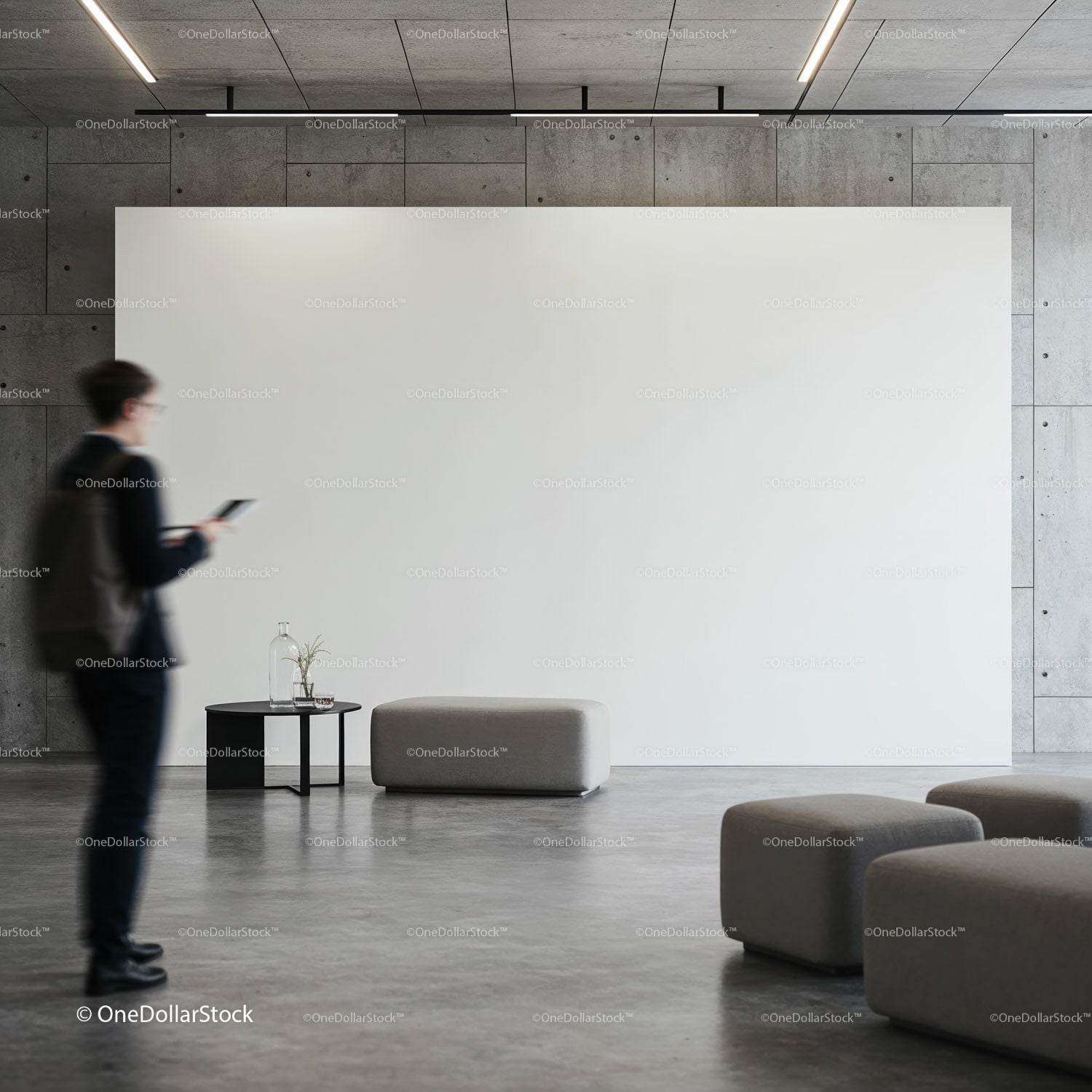 Nowoczesne, minimalistyczne lobby z niewyraźną postacią korzystającą z telefonu