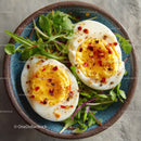Boiled Eggs with Fresh Green Salad in a Rustic Blue Bowl