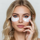 Young Woman Applying Eye Patches for Skincare Routine