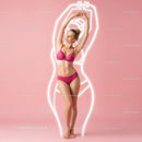 Elegant Woman in Pink Lingerie Performing Dance Pose in Studio
