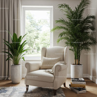 Elegant indoor beige armchair with lush houseplants by large window