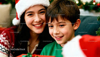 Smiling woman and boy enjoying Christmas moments together