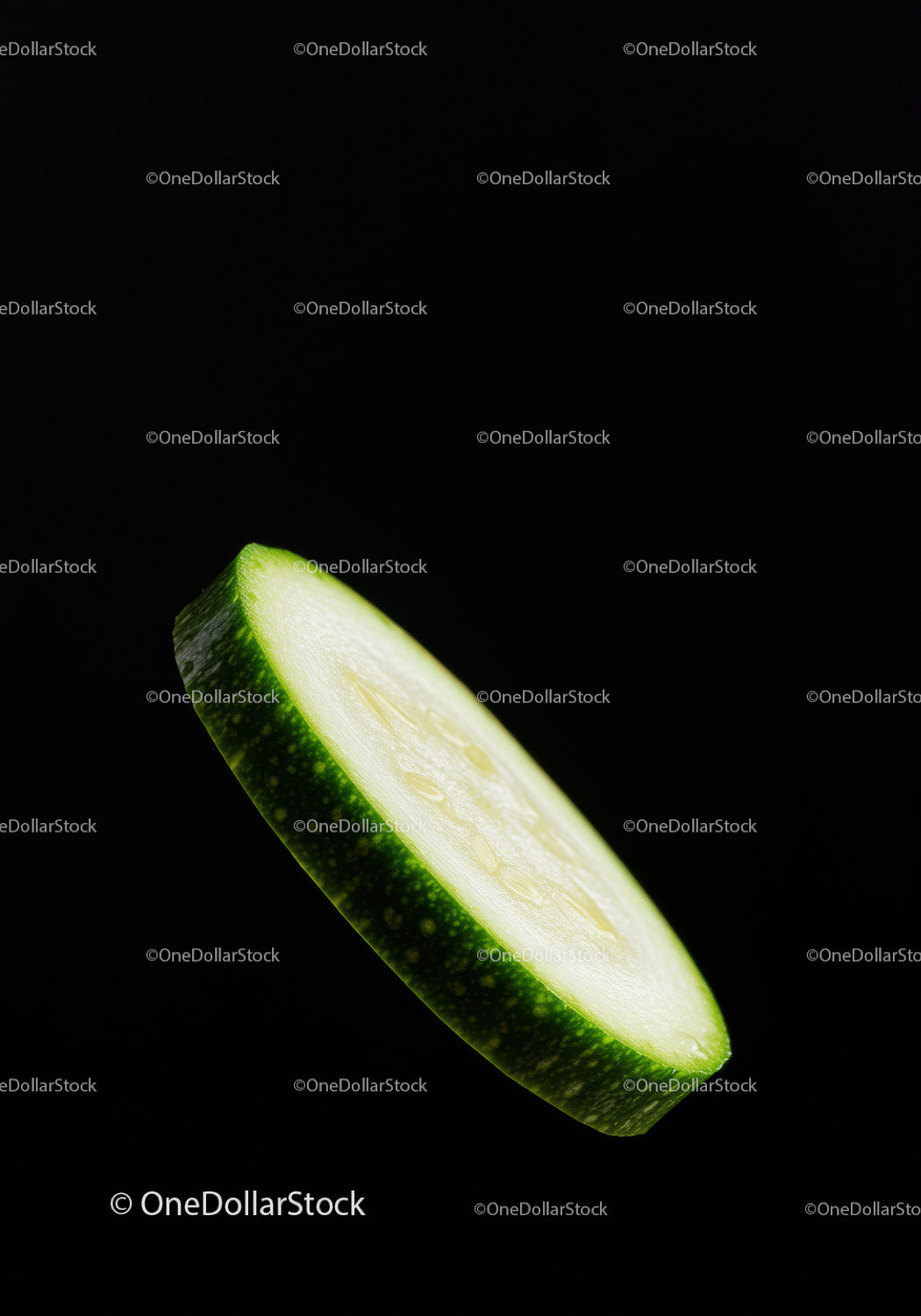 Fresh cucumber slice isolated on black background