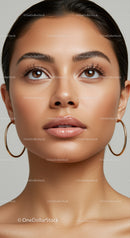 Close-up of Beautiful Woman with Brown Eyes and Hoop Earrings