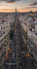 Busy City Street with Classic Architecture and Evening Traffic in Paris