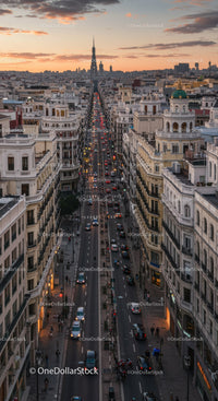Busy City Street with Classic Architecture and Evening Traffic in Paris