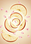 Red apple slices spiraling with floating pink petals
