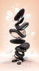 Elegant Abstract Art Composition with Black Polished Stones and Floating Spheres