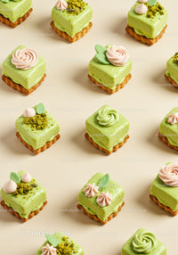 Assorted Green Pistachio Mini Cakes with Cream Decorations