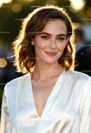 Smiling woman with natural makeup in golden sunlight