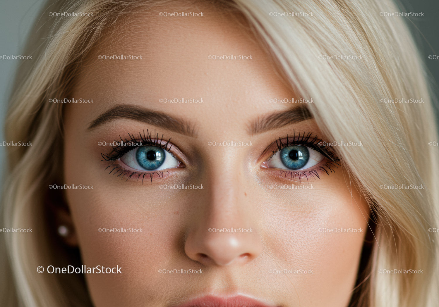 Close Up of Woman with Striking Blue Eyes and Blonde Hair
