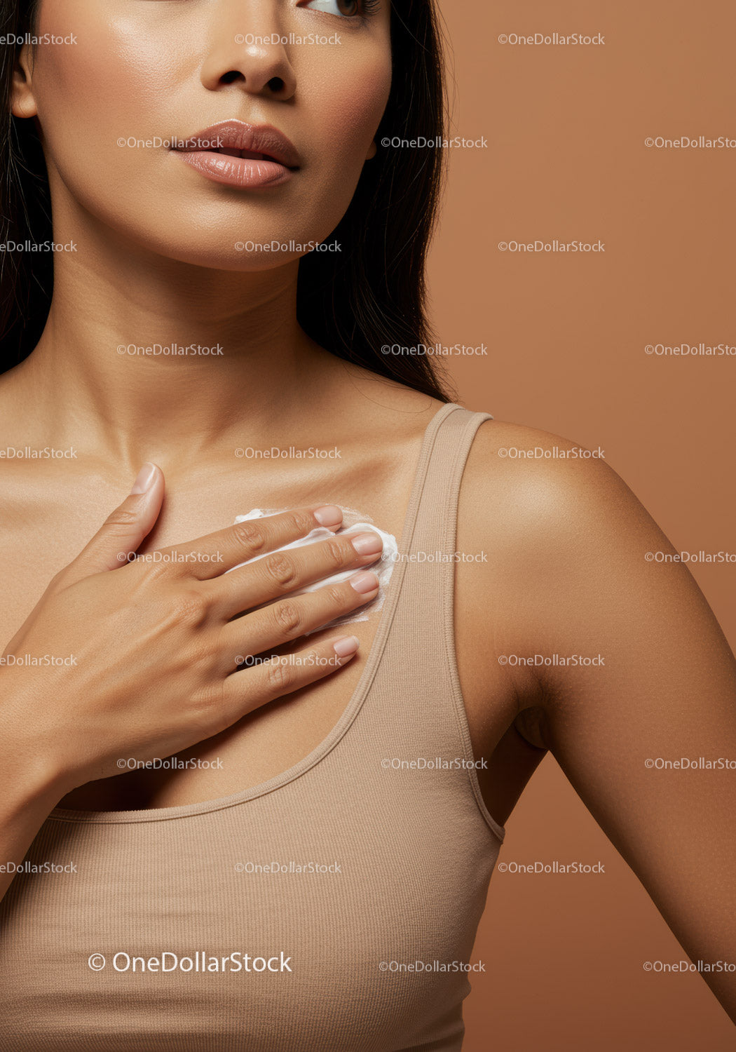 Close-Up of a Woman Applying Moisturizer on Shoulder for Healthy Skin