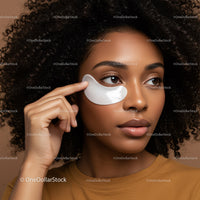 Beautiful Woman Applying Under Eye Gel Patch in Natural Skincare Routine