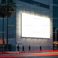 Urban street scene with illuminated city billboard at dusk