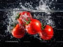 Red Tomatoes Splashing in Water with Fresh and Juicy Appeal