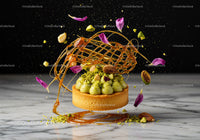 Pistachio tart with caramel decoration and flower petals