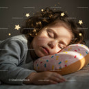 Peaceful child sleeping on colorful doughnut pillow