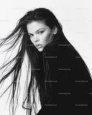 Elegant Black and White Portrait of a Woman with Flowing Hair