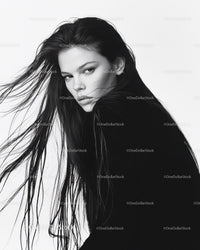 Elegant Black and White Portrait of a Woman with Flowing Hair