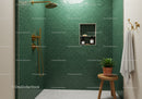 Modern Shower with Green Tiles and Brass Fixtures