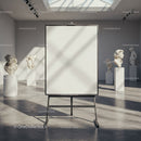 Blank easel in gallery with classical white sculptures