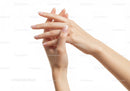 Well manicured hands with French nail polish gesture
