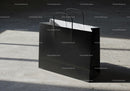 Minimalist Black Shopping Bag on Concrete Floor