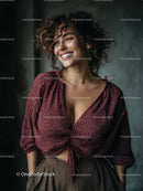 Fashionable Woman Smiling with Curly Hair in Casual Burgundy Top