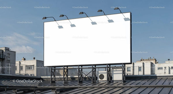 Blank Billboard on Rooftop Against Clear Blue Sky JPG Mockup Image