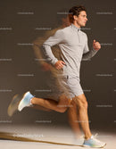 Athlete running indoors with focused expression