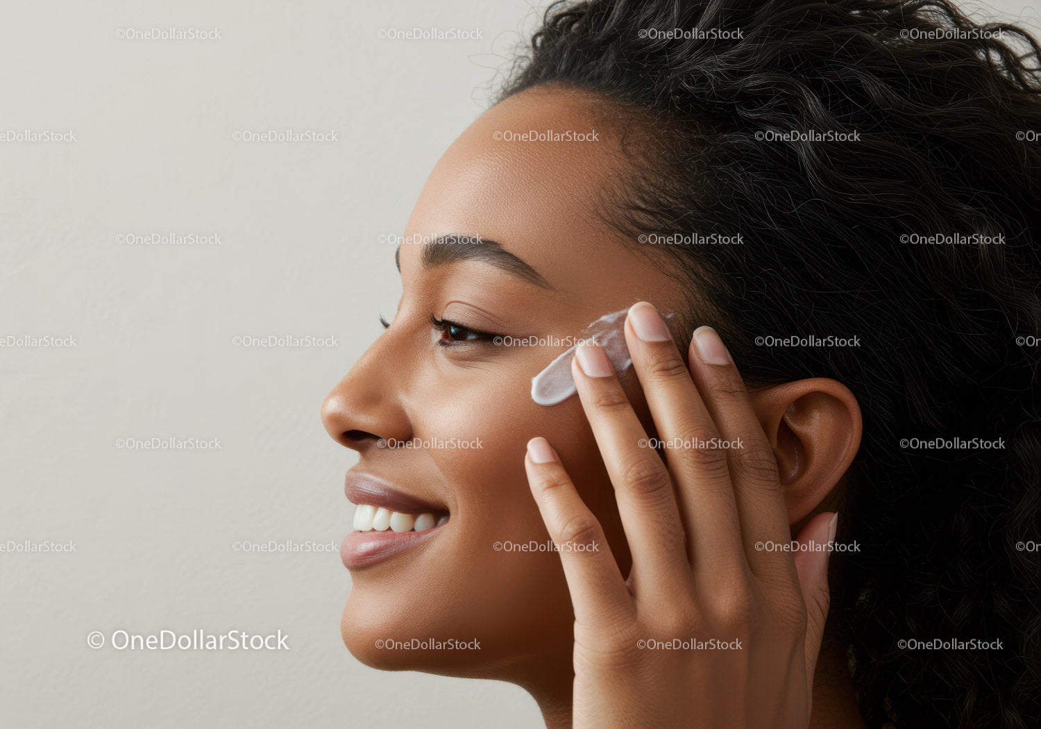 Woman Applying Skincare Cream for Glowing Skin