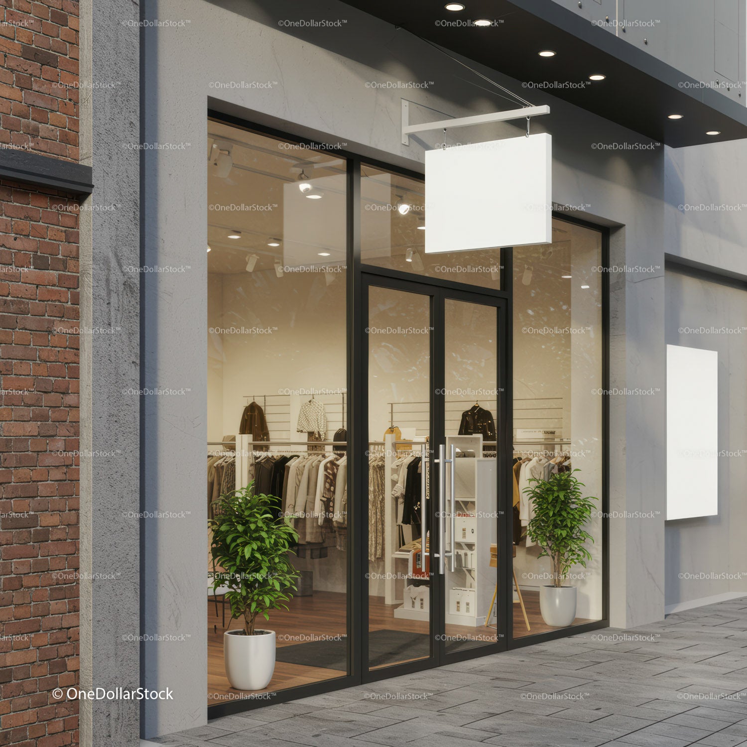 Modern Clothing Storefront with Glass Doors and Green Plants