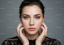 Portrait of a Beautiful Woman with Blue Eyes and Natural Makeup