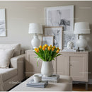 Bright Living Room with Yellow Tulips and Modern Decor
