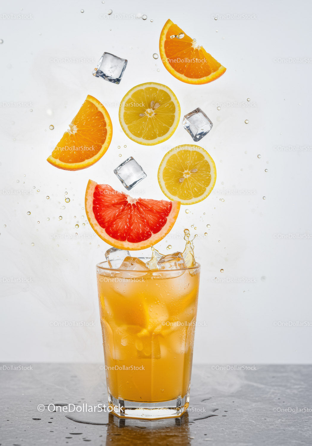 Refreshing Citrus Cocktail with Ice Cubes Splashing