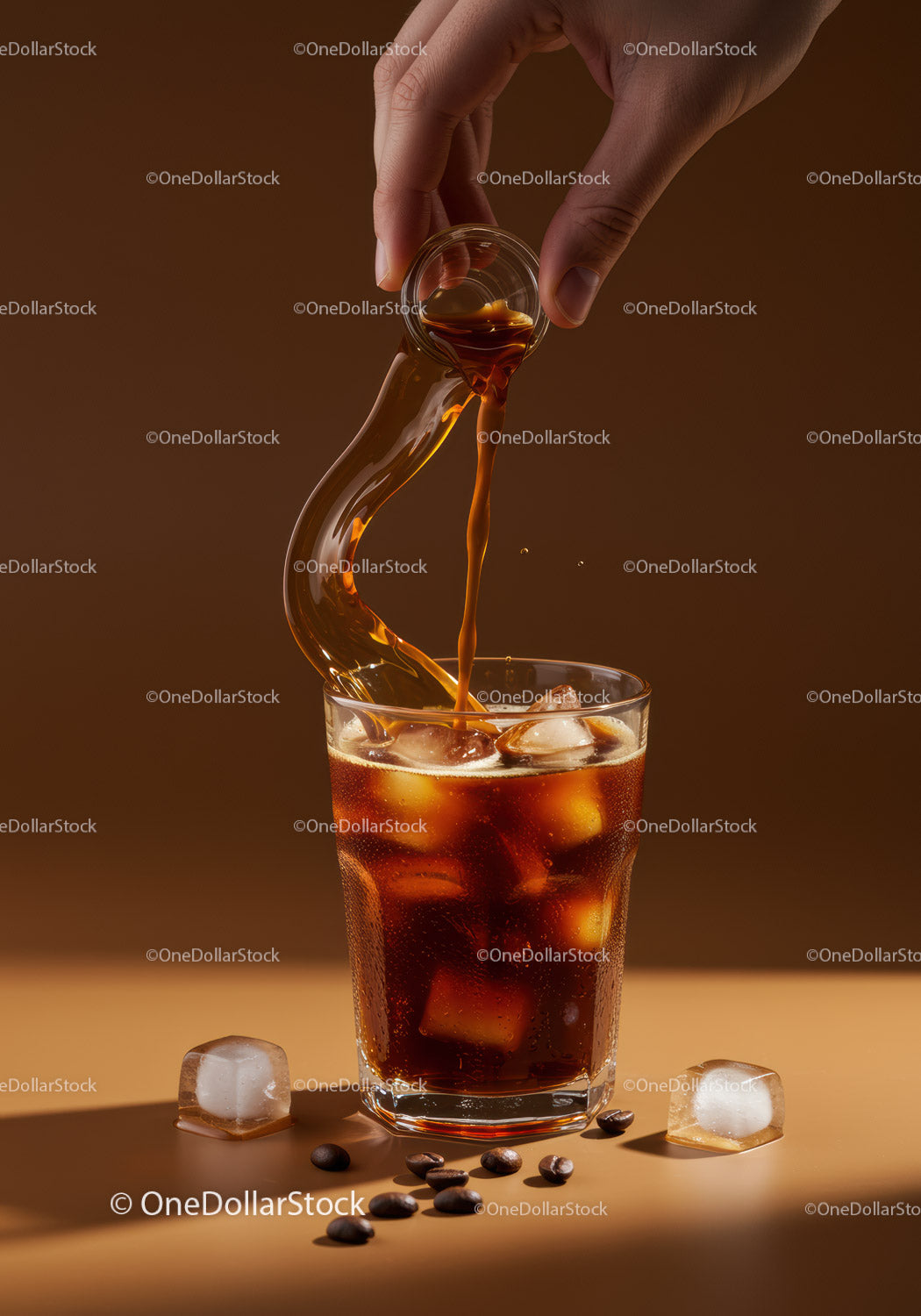 Hand Pouring Cold Brew Coffee Over Ice Cubes