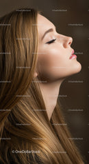 Young woman with eyes closed in peaceful side profile