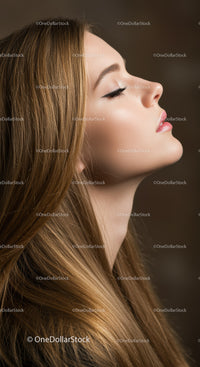 Young woman with eyes closed in peaceful side profile